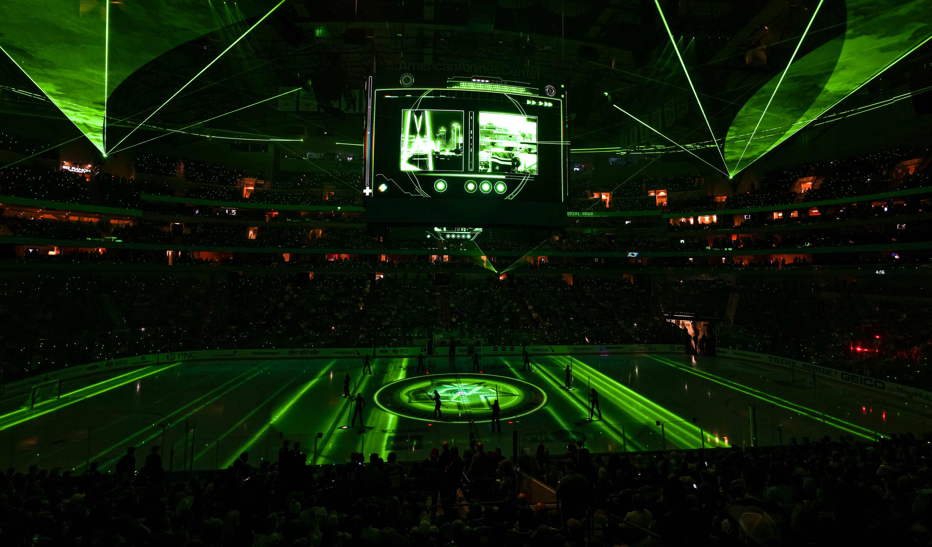 Texas Hockey Arena lit up in green`Z